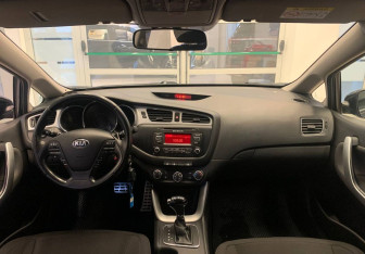 Подержанный автомобиль Kia Ceed Wagon 2014 года (11 фото)