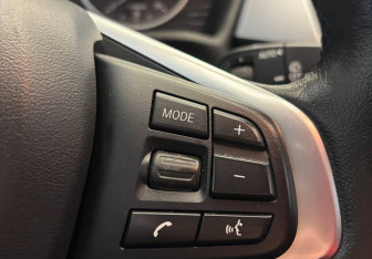 Подержанный автомобиль BMW X1 2015 года (19 фото)