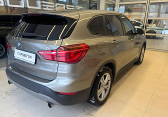 Подержанный автомобиль BMW X1 2015 года (4 фото)