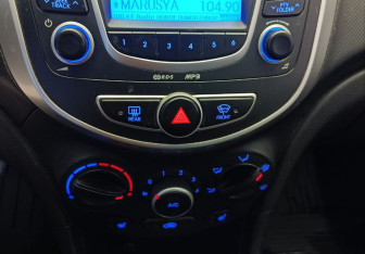 Подержанный автомобиль Hyundai Solaris Hatchback 2012 года (13 фото)