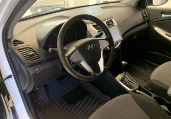 Подержанный автомобиль Hyundai Solaris Sedan 2013 года (13 фото)