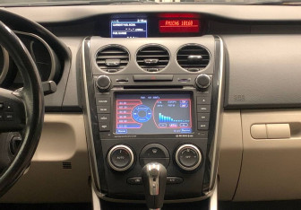 Подержанный автомобиль Mazda CX-7 2010 года (13 фото)