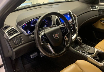 Подержанный автомобиль Cadillac SRX 2014 года (14 фото)