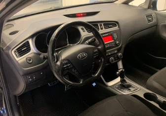 Подержанный автомобиль Kia Ceed Wagon 2014 года (13 фото)