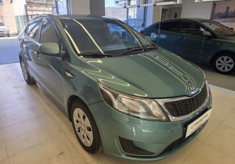 Подержанный автомобиль Kia Rio Sedan 2013 года (3 фото)