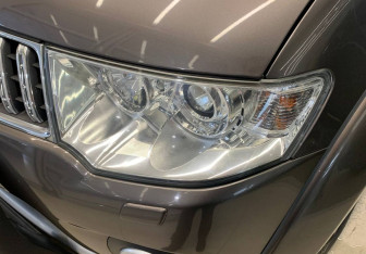 Подержанный автомобиль Mitsubishi Pajero Sport 2012 года (15 фото)