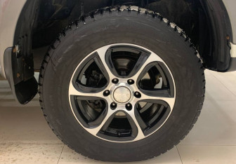 Подержанный автомобиль Mitsubishi L200 2014 года (16 фото)