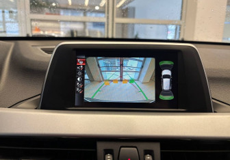 Подержанный автомобиль BMW X1 2015 года (25 фото)