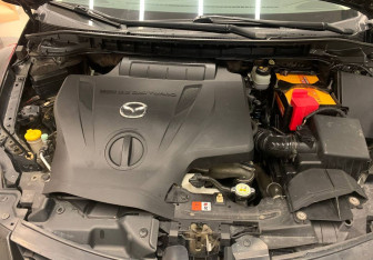 Подержанный автомобиль Mazda CX-7 2010 года (7 фото)