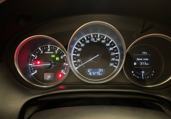 Подержанный автомобиль Mazda CX-5 2015 года (10 фото)