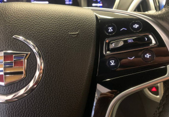 Подержанный автомобиль Cadillac SRX 2014 года (18 фото)