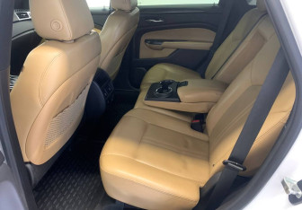 Подержанный автомобиль Cadillac SRX 2014 года (10 фото)