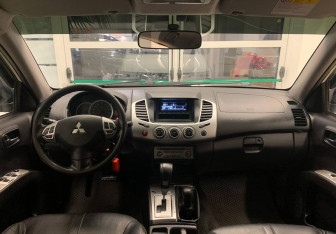 Подержанный автомобиль Mitsubishi L200 2014 года (12 фото)