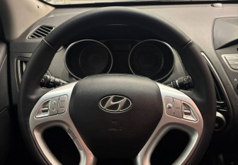 Подержанный автомобиль Hyundai ix35 2014 года (9 фото)