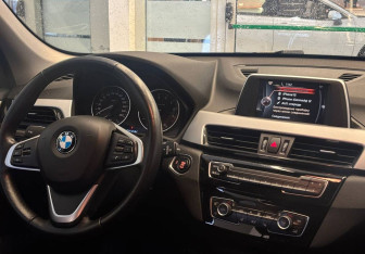 Подержанный автомобиль BMW X1 2015 года (9 фото)