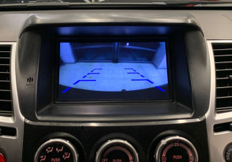 Подержанный автомобиль Mitsubishi Pajero Sport 2013 года (22 фото)