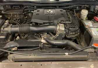 Подержанный автомобиль Mitsubishi Pajero Sport 2012 года (7 фото)