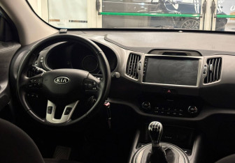 Подержанный автомобиль Kia Sportage 2012 года (8 фото)