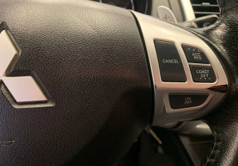 Подержанный автомобиль Mitsubishi Pajero Sport 2012 года (18 фото)