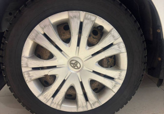 Подержанный автомобиль Toyota Corolla Sedan 2010 года (14 фото)