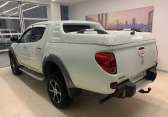 Подержанный автомобиль Mitsubishi L200 2014 года (6 фото)