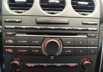 Подержанный автомобиль Mazda CX-7 2010 года (12 фото)