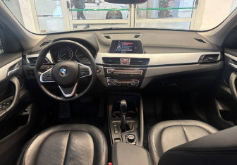 Подержанный автомобиль BMW X1 2015 года (12 фото)