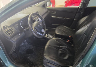 Подержанный автомобиль Kia Rio Sedan 2013 года (13 фото)
