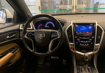 Подержанный автомобиль Cadillac SRX 2014 года (9 фото)