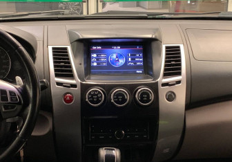 Подержанный автомобиль Mitsubishi Pajero Sport 2013 года (13 фото)