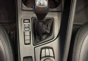 Подержанный автомобиль BMW X1 2015 года (23 фото)