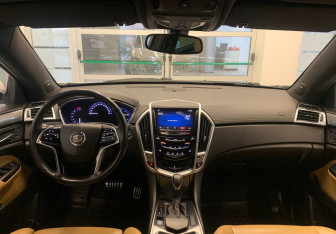 Подержанный автомобиль Cadillac SRX 2014 года (12 фото)