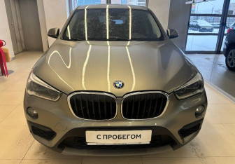Подержанный автомобиль BMW X1 2015 года (2 фото)